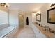 Large bathroom with granite countertops, jacuzzi, and large shower at 1023 Spruce Creek Ln, Lawrenceville, GA 30045
