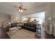 Open-concept living space seamlessly connects to a modern kitchen with ample seating at 1023 Spruce Creek Ln, Lawrenceville, GA 30045