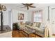 Cozy living room with modern decor, whitewashed brick, and large windows at 24 Daniel St # 6, Atlanta, GA 30312