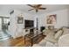 Cozy living room with modern decor, whitewashed brick, and wood floors at 24 Daniel St # 6, Atlanta, GA 30312