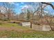 Beautiful backyard view showcasing a small waterfall feature and verdant greenery at 4144 D Youville Trce, Atlanta, GA 30341