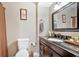 Neutral bathroom featuring dark vanity, ample counter space, and coordinated decor at 4144 D Youville Trce, Atlanta, GA 30341