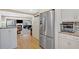 Kitchen featuring stone countertops and backsplash with stainless appliances at 4144 D Youville Trce, Atlanta, GA 30341