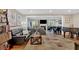 Expansive living room featuring hardwood floors, neutral paint, and an open space for entertaining at 4144 D Youville Trce, Atlanta, GA 30341