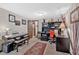 Home office with large desk, office chair, piano, and carpet flooring at 4144 D Youville Trce, Atlanta, GA 30341