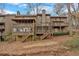 Multi-level home with screened-in porches and decks, nestled in a wooded setting at 4144 D Youville Trce, Atlanta, GA 30341