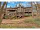 Multi-level home with screened-in porches and decks, nestled in a wooded setting at 4144 D Youville Trce, Atlanta, GA 30341