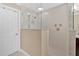 Modern walk-in shower with glass partition, white subway tile, and rainfall shower head at 4144 D Youville Trce, Atlanta, GA 30341