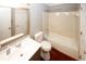 Bathroom with a toilet, vanity, and bathtub featuring classic fixtures and elegant finishes at 711 Cypress Pointe St, Johns Creek, GA 30022