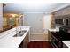 Bright kitchen with stainless appliances, a sink and a breakfast bar at 711 Cypress Pointe St, Johns Creek, GA 30022