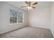 Bedroom featuring natural lighting, carpet, and neutral paint at 750 Beckenham Walk Dr, Dacula, GA 30019