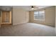 Bedroom featuring carpet floors, a ceiling fan, and natural lighting at 750 Beckenham Walk Dr, Dacula, GA 30019