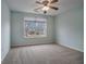 Bedroom featuring carpet and natural lighting at 750 Beckenham Walk Dr, Dacula, GA 30019