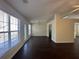 Dining area featuring dark laminate floors, a chandelier and direct access to the backyard at 275 Circle Rd, Dacula, GA 30019