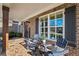 Charming front porch with stone flooring, Adirondack chairs and a welcoming ambiance at 330 Peninsula Pt, Canton, GA 30115