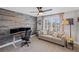 Office space features wood accent wall, a large window, and a comfortable seating area at 330 Peninsula Pt, Canton, GA 30115
