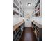 Walk-in pantry featuring custom shelving and a view to the outdoors at 330 Peninsula Pt, Canton, GA 30115