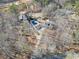 Aerial view of house with a long driveway and a pool at 444 Pineview Dr, Canton, GA 30114