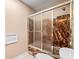 Bathroom showcasing a tiled shower-tub combo and tiled accent wall at 444 Pineview Dr, Canton, GA 30114
