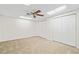 Bedroom with a ceiling fan and closet, offering a relaxing and organized space at 444 Pineview Dr, Canton, GA 30114