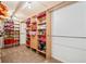 Well-organized walk-in closet with ample shelving and storage for all your belongings at 444 Pineview Dr, Canton, GA 30114