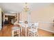 Formal dining room with hardwood floors and bright natural light at 444 Pineview Dr, Canton, GA 30114