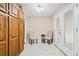 Bright foyer featuring a tiled floor, french doors and a storage closet at 444 Pineview Dr, Canton, GA 30114