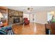 Cozy living room featuring a stone fireplace, hardwood floors, and ample space at 444 Pineview Dr, Canton, GA 30114