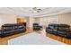 Large living room featuring a trey ceiling, wood floors, and comfortable seating at 444 Pineview Dr, Canton, GA 30114