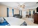 Bright primary bedroom features neutral colors, carpeted floors, and plenty of natural light at 444 Pineview Dr, Canton, GA 30114