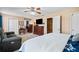 Large primary bedroom with a sitting area, hardwood floors, and a walk-in closet at 444 Pineview Dr, Canton, GA 30114