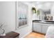 Bright, airy bathroom featuring a dark granite countertop and updated fixtures at 244 Sherbrook Nw Ct, Marietta, GA 30064