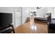 Bright bedroom with an ensuite bathroom, wood floors and walk-out patio door at 244 Sherbrook Nw Ct, Marietta, GA 30064