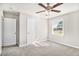 Bright bedroom with ceiling fan and neutral carpet at 2716 Wedgewood Ter, Decatur, GA 30032
