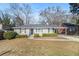 Charming ranch-style home featuring a well-manicured lawn and inviting front entrance at 2716 Wedgewood Ter, Decatur, GA 30032