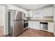 Well-equipped kitchen featuring stainless steel appliances and granite countertops at 2716 Wedgewood Ter, Decatur, GA 30032
