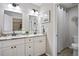 Bathroom featuring double sink vanity with marble countertop at 2815 Pine Mountain Nw Cir, Kennesaw, GA 30152