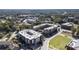 Urban aerial view with apartment buildings, green spaces, and city streets at 58 Canton St # 302, Alpharetta, GA 30009