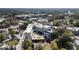 Beautiful aerial view of a hotel with a courtyard, surrounded by lush trees and streets at 58 Canton St # 302, Alpharetta, GA 30009