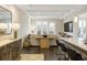 Bright living room with hardwood floors and a door leading to the balcony at 58 Canton St # 302, Alpharetta, GA 30009