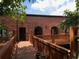 Brick exterior with wooden deck and garden accents at 184 Sw Walker Street # E, Atlanta, GA 30313