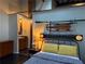 Bedroom featuring vintage decor, ample closet space and warm lighting at 184 Sw Walker Street # E, Atlanta, GA 30313
