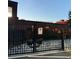 Exterior building view featuring a decorative metal gate with Tow Zone Parking at 184 Sw Walker Street # E, Atlanta, GA 30313
