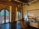 Spacious living room features exposed brick, high ceilings, and access to a balcony at 184 Sw Walker Street # E, Atlanta, GA 30313