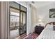 A glass door opens to a covered balcony with wrought iron railings overlooking the street at 3286 Northside Nw Pkwy # 304, Atlanta, GA 30327