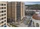 View of a well-maintained apartment building with elegant architecture, landscaping, and convenient parking at 3286 Northside Nw Pkwy # 304, Atlanta, GA 30327