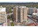 Elevated view of the apartment building surrounded by trees and other apartment buildings in the background at 3286 Northside Nw Pkwy # 304, Atlanta, GA 30327