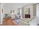 Elegant living room featuring neutral tones, hardwood floors, and abundant seating at 3286 Northside Nw Pkwy # 304, Atlanta, GA 30327