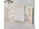 Neutral bedroom showcasing ensuite access and bright atmosphere at 3600 Elkhorn Nw Ct, Duluth, GA 30096