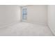 Bedroom with carpet, a window, and neutral paint; ready for personalization and comfortable living at 3600 Elkhorn Nw Ct, Duluth, GA 30096